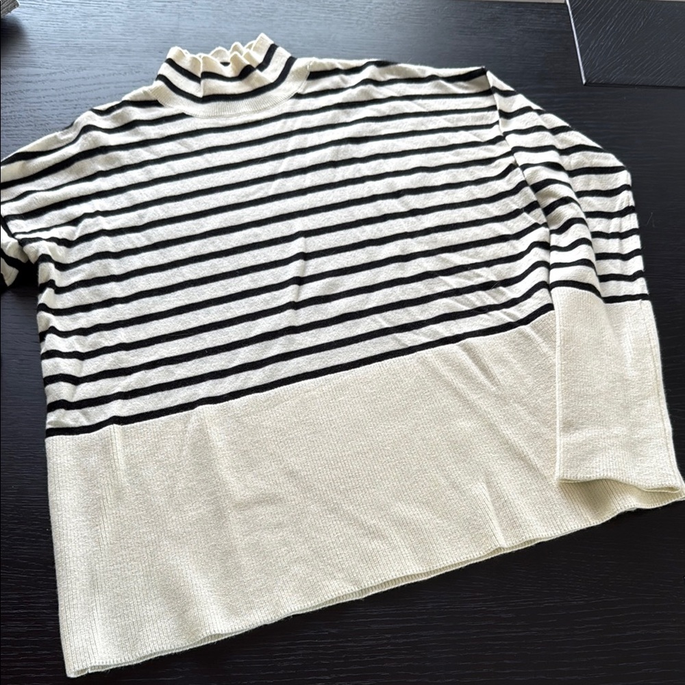 a loves a women’s black and cream striped sweater